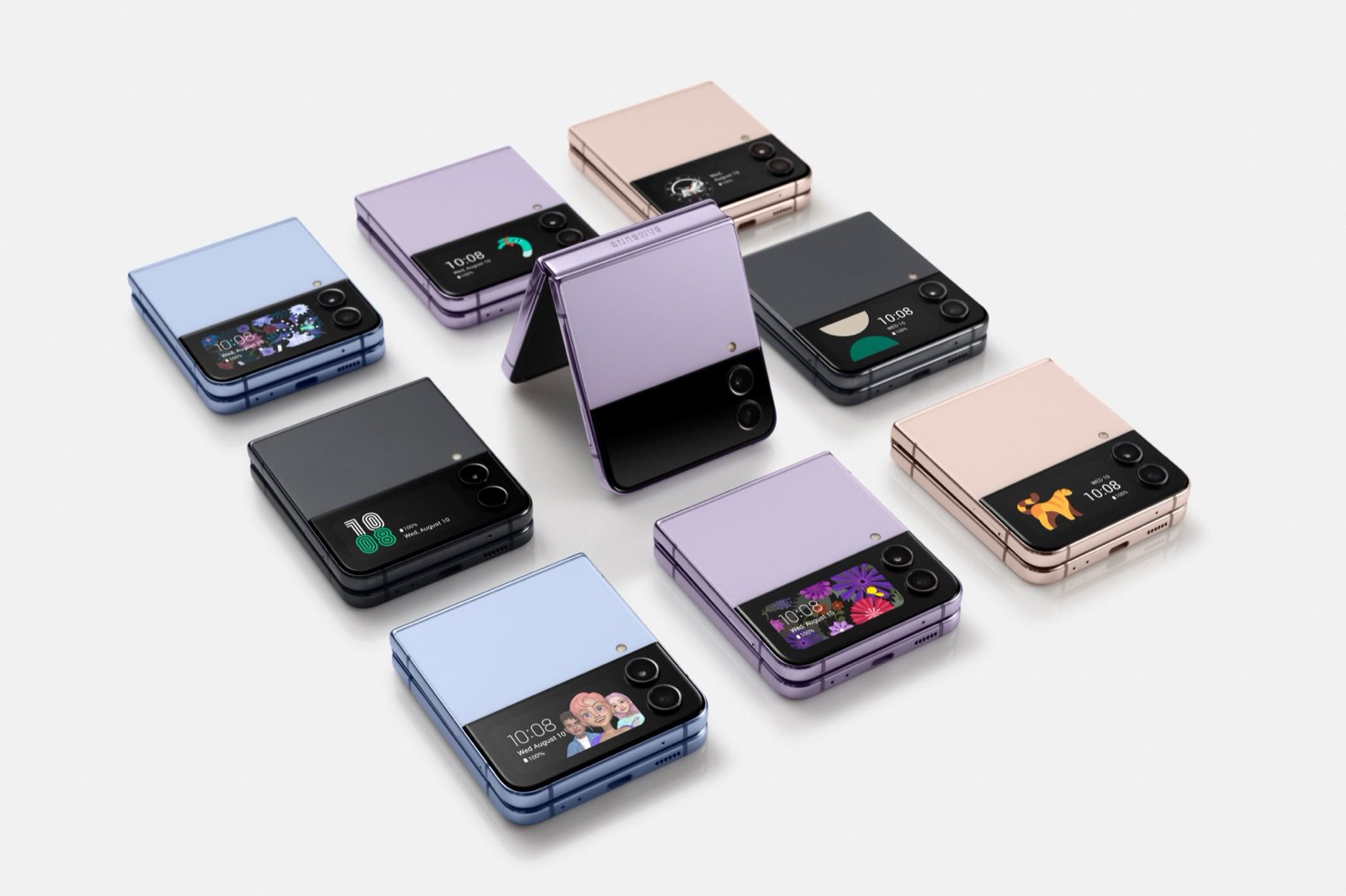 Plusieurs Galaxy Z Flip 4 fermés dans différents coloris, avec leur petit écran externe allumé